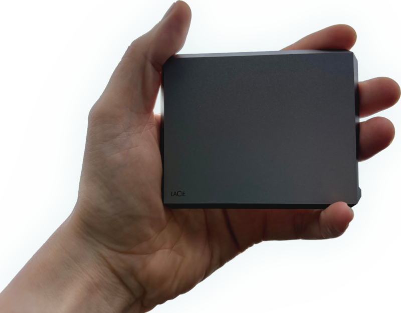 A hand holding a LaCie External Mobile SSD for data recovery